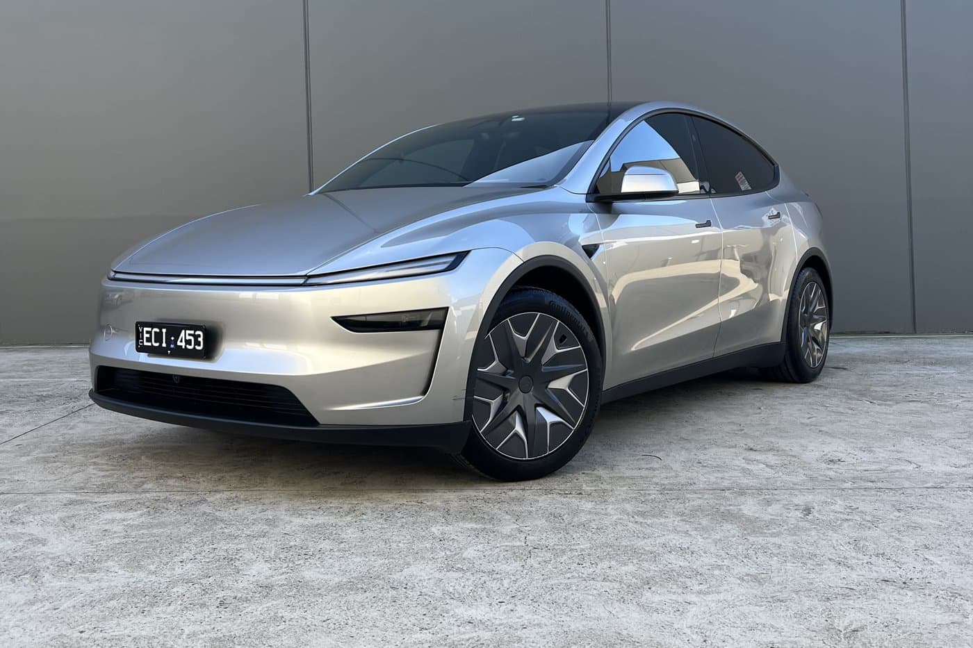 Silver Tesla Model Y after a detail
